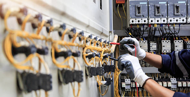 Professional Electrician technician working in Dania Beach, FL